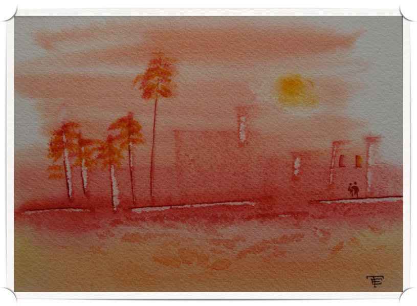 Ville de sable et son couché orangé